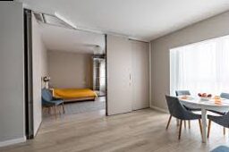 Functional bedroom with Sonfoner with sliding doors